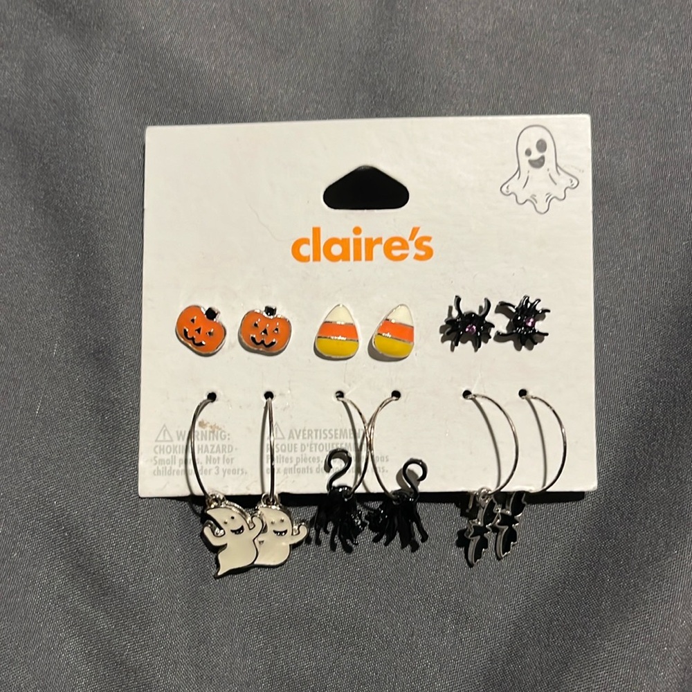 Claire spooky set earrings featuring pumpkin, ghost,cats, and spiders.